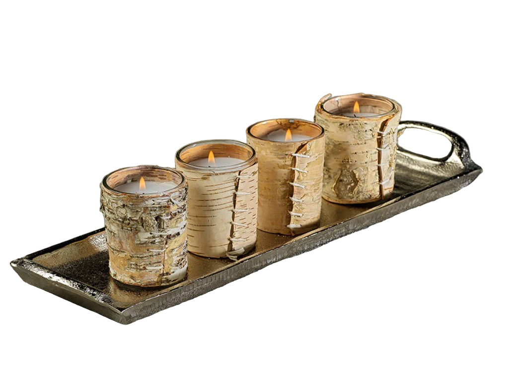 Set of four birch bark candles on a metal tray with a neutral background